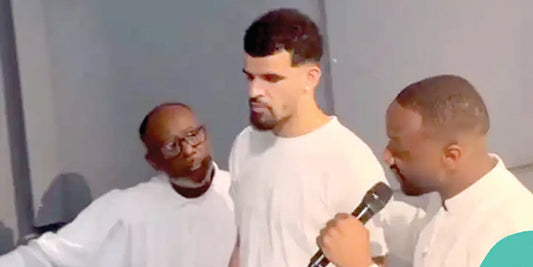 Striker Dom takes baptism plunge