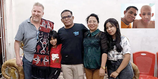 Marty Davison, left, main pic, with Pastor Weros and his family. Inset, Pastor Weros with Justin.