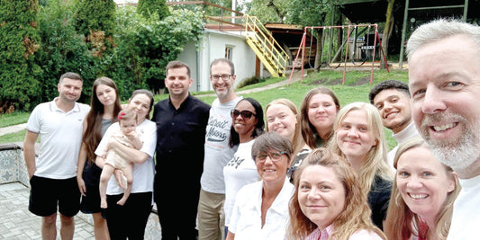 Liz Face, centre in white shirt, with a visiting mission team from Halifax in the UK.