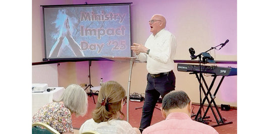 Mark Ryan speaks at the conference